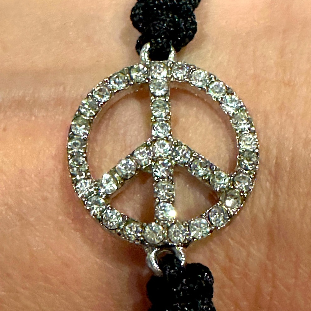 New! Silvertone “Peace” sign black macrame adjustable bracelet